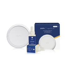 Pura smart fragrance diffuser set with blue bottle and packaging on a white background