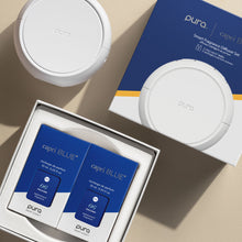 Pura capri BLUE smart fragrance diffuser set with packaging on a beige surface