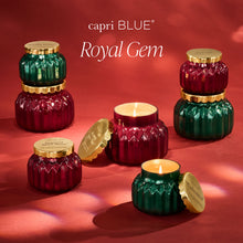 capri BLUE Royal Gem candles on a red background