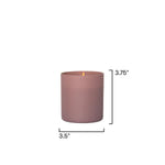 A matte dusty rose candle with a lit wick, shown with black dimension lines and text indicating a height of 3.75 inches and a width of 3.