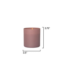 A matte dusty rose candle with a lit wick, shown with black dimension lines and text indicating a height of 3.75 inches and a width of 3.