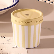 Isla Bloom container with striped design on a surface