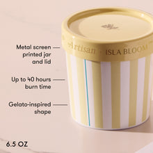 Isla Bloom candle jar with striped design on a beige background