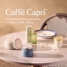 Caffè Capri products on a marble table with a chair in the background