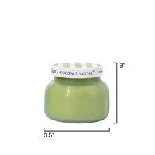 Green candle jar with white lid and dimensions on a white background