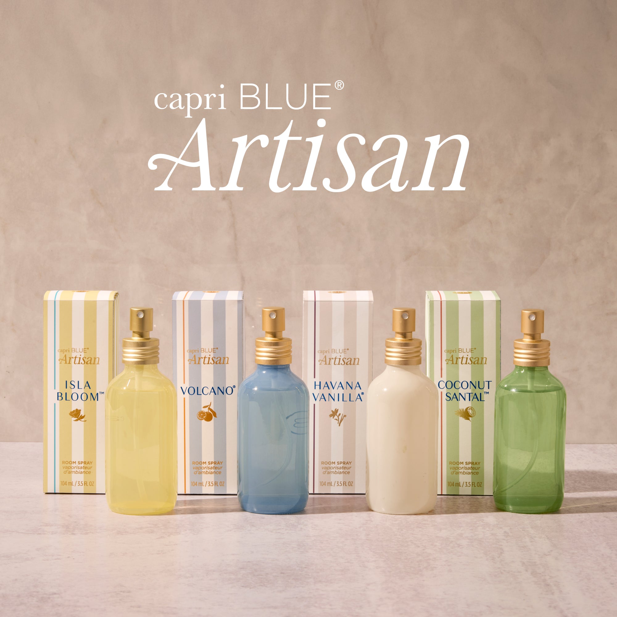 capri BLUE Artisan room spray bottles and boxes on a textured surface with 'capri BLUE Artisan' branding.