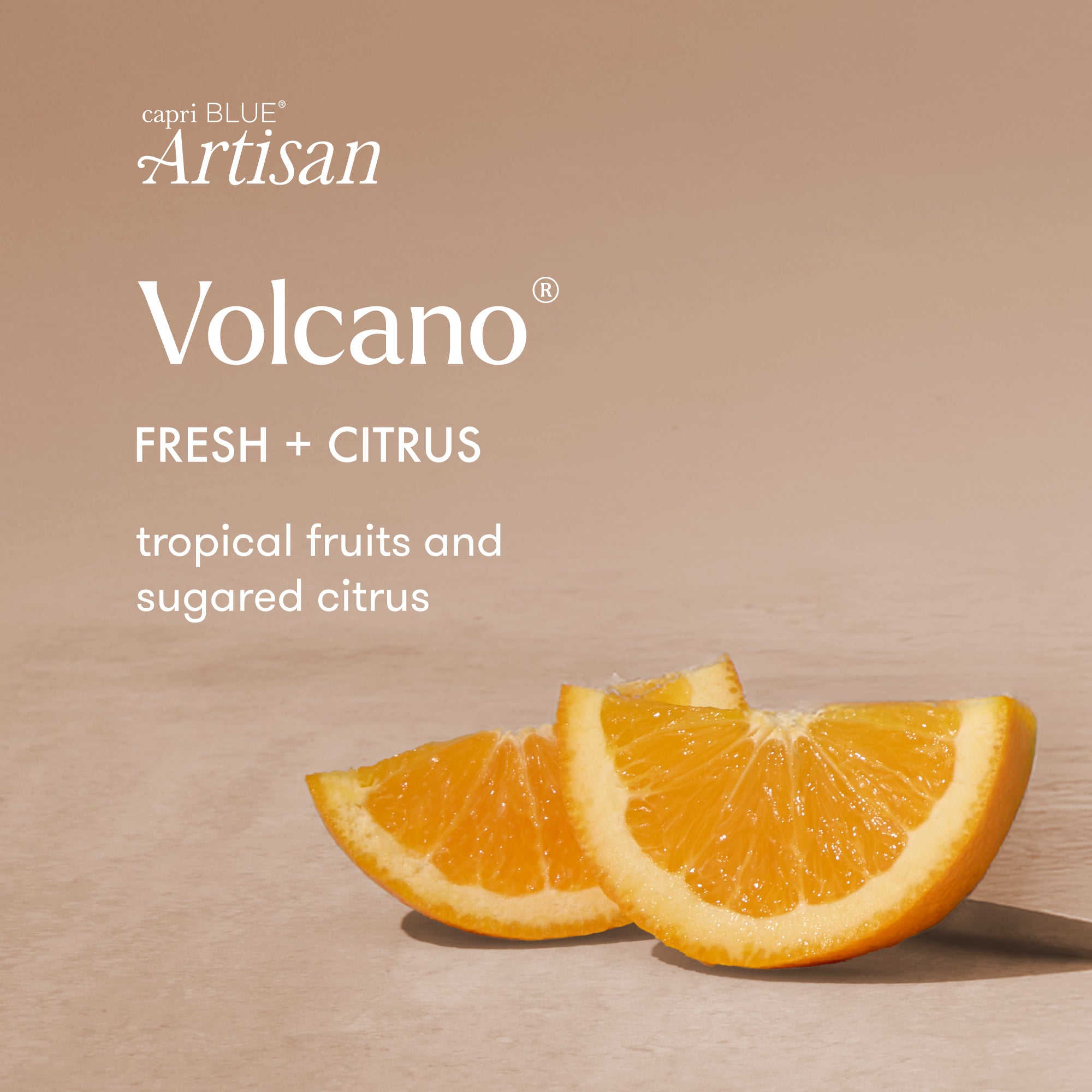 Two orange slices on a beige background with 'capri BLUE Artisan Volcano' branding.