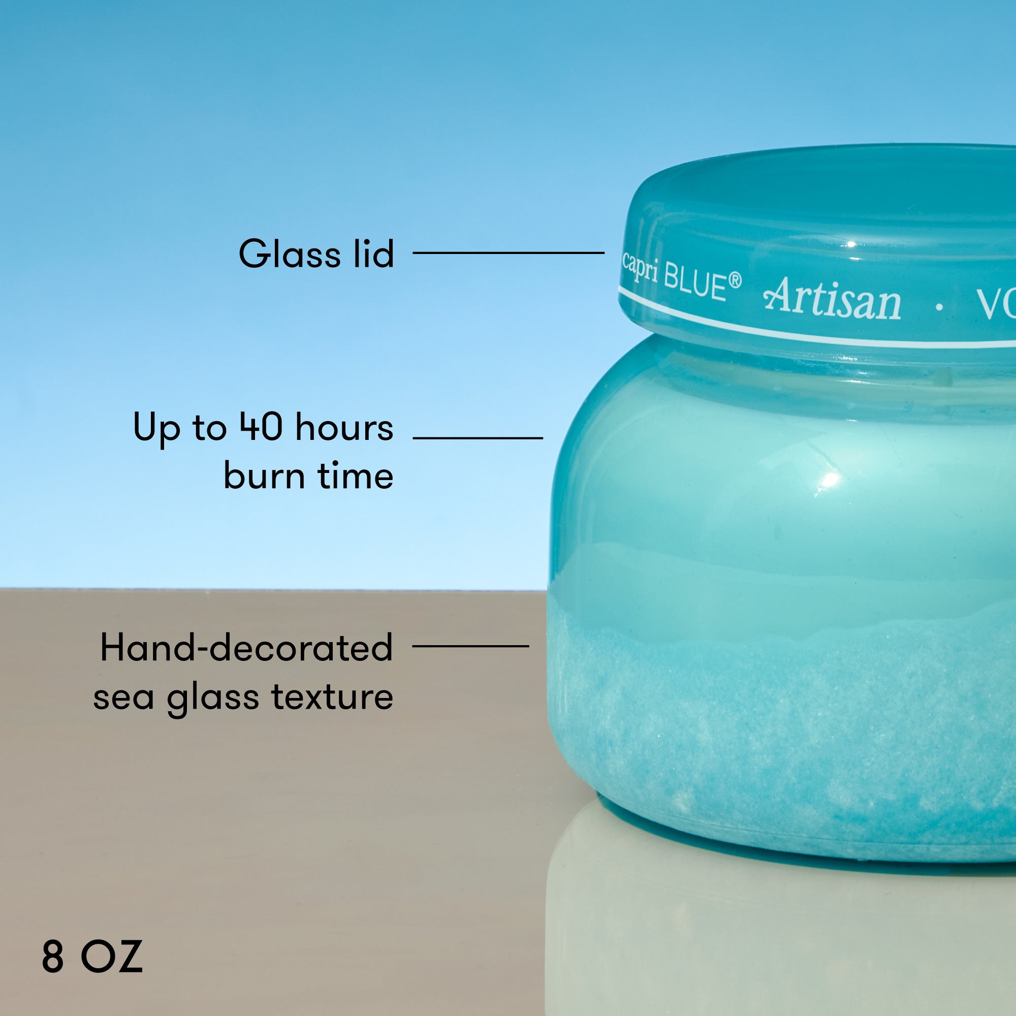 Blue glass jar with a label, featuring text on its lid and body.