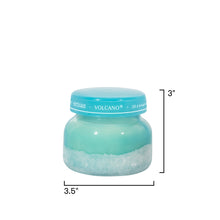 Small blue jar with a white label on a white background