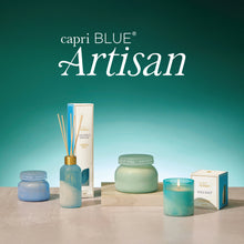 Capri Blue Artisan logo with three candles and a reed diffuser on a marble surface and a teal background.