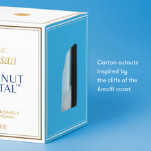 Candle box with 'Natal' branding on a blue background