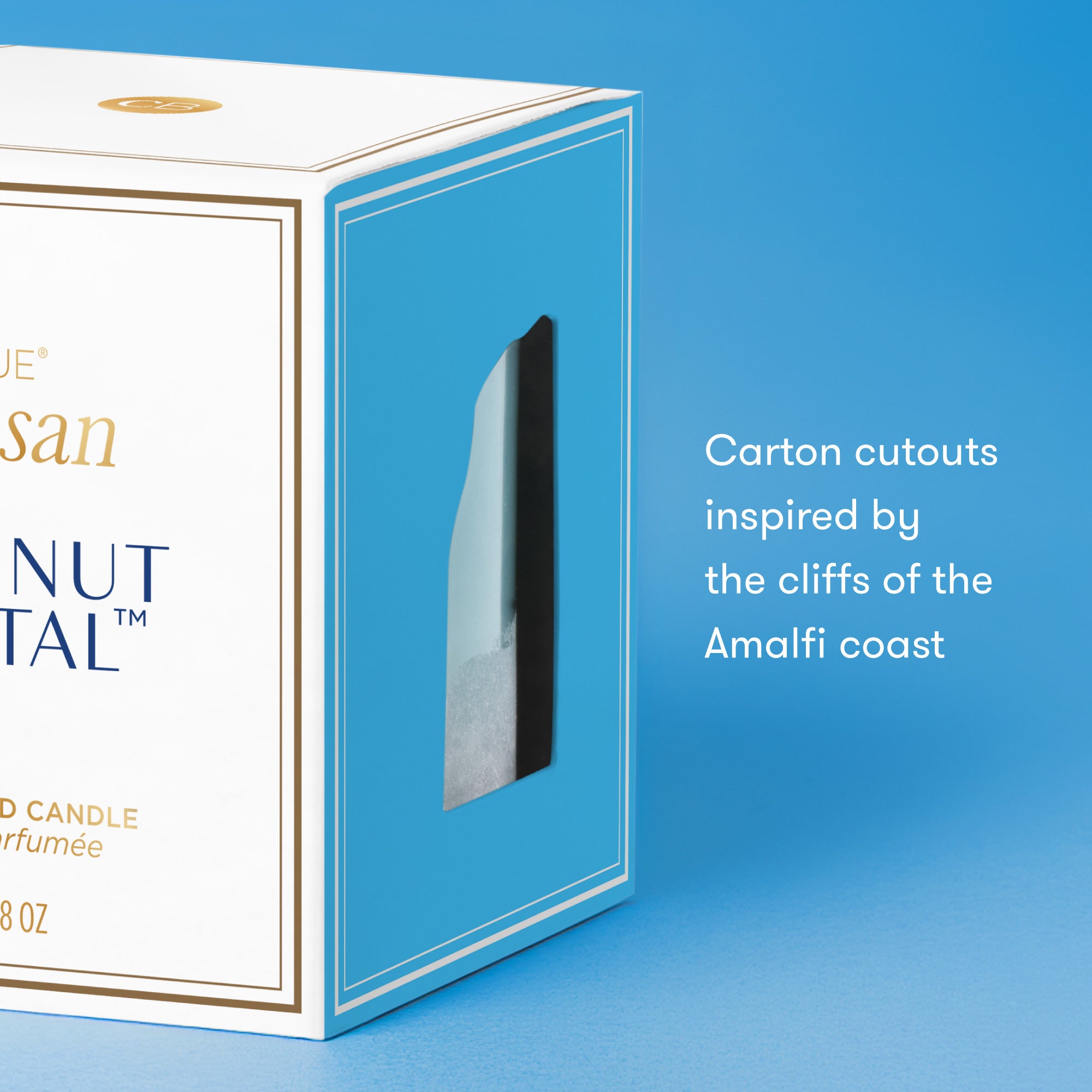 Candle box with 'Natal' branding on a blue background