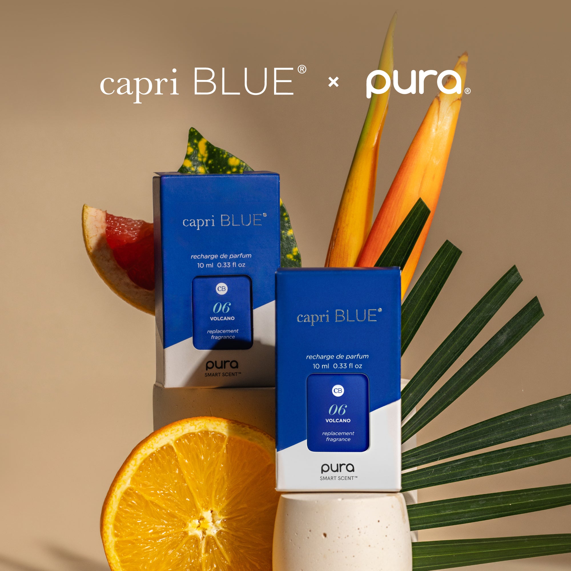capri BLUE x pura perfume refills with tropical elements on a beige background