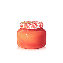 Jar with a floral-patterned lid on a white background