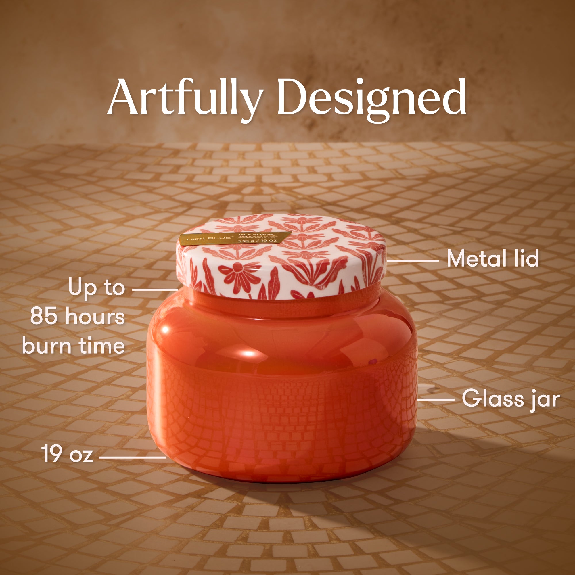 Red candle jar with floral lid on a textured surface, labeled with features.