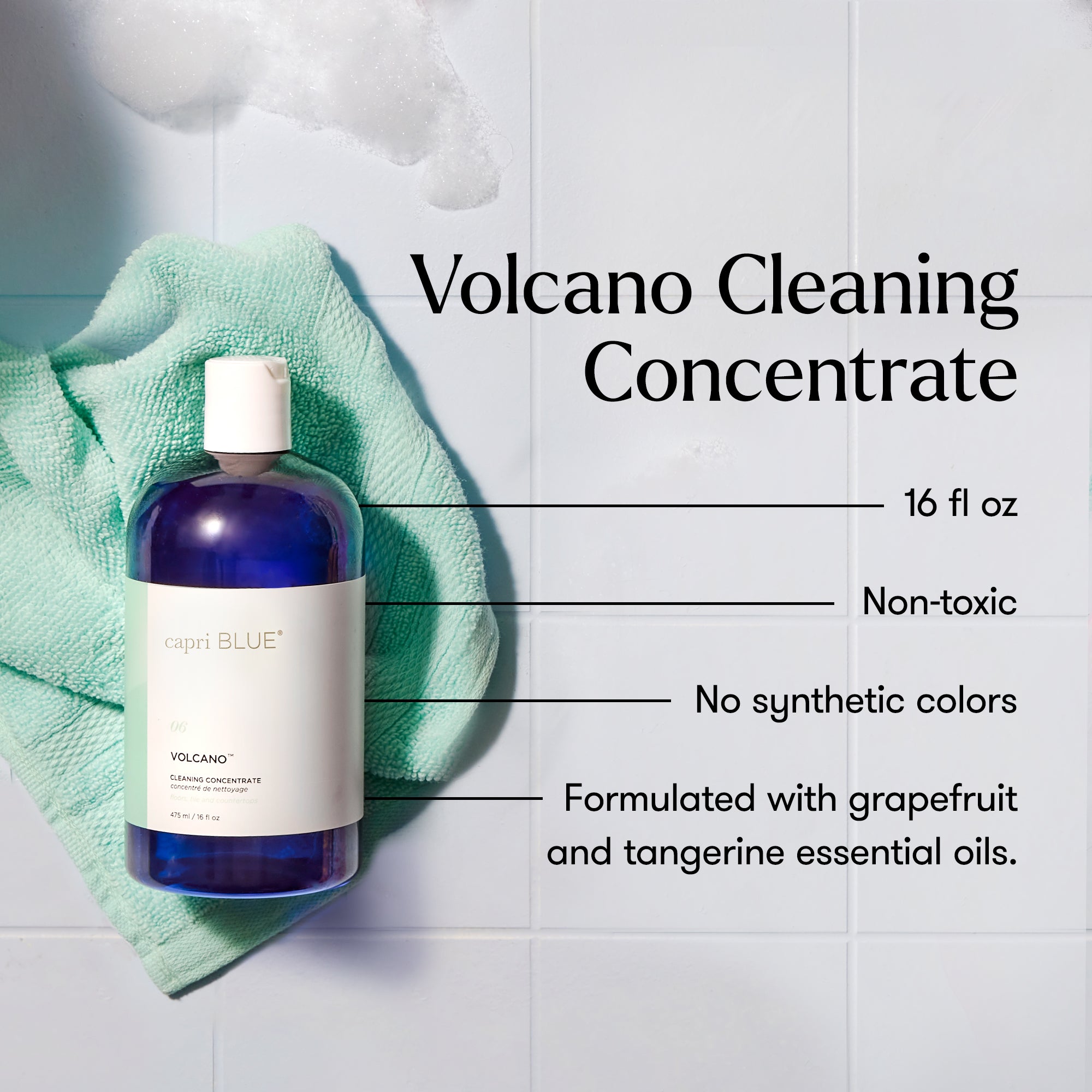 Bottle of Volcano Cleaning Concentrate with product details on a tiled wall background