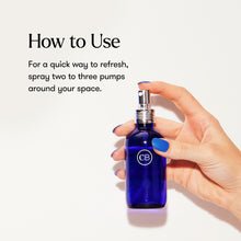 Hand holding room spray on a beige background with 'How to Use' text and instructions