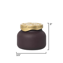 A dark brown jar candle with a gold lid, shown with dimension lines indicating a height of 3 inches and a width of 3.5 inches on a white background.