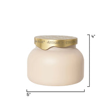 A cream-colored jar candle with a metallic gold lid, shown with black dimension lines indicating a height of 4 inches and a width of 5 inches on a white background.