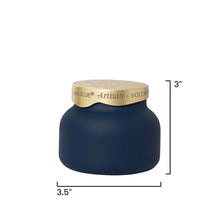 A navy blue jar candle with a textured gold lid, shown with dimension lines indicating a height of 3 inches and a width of 3.5 inches on a white background.