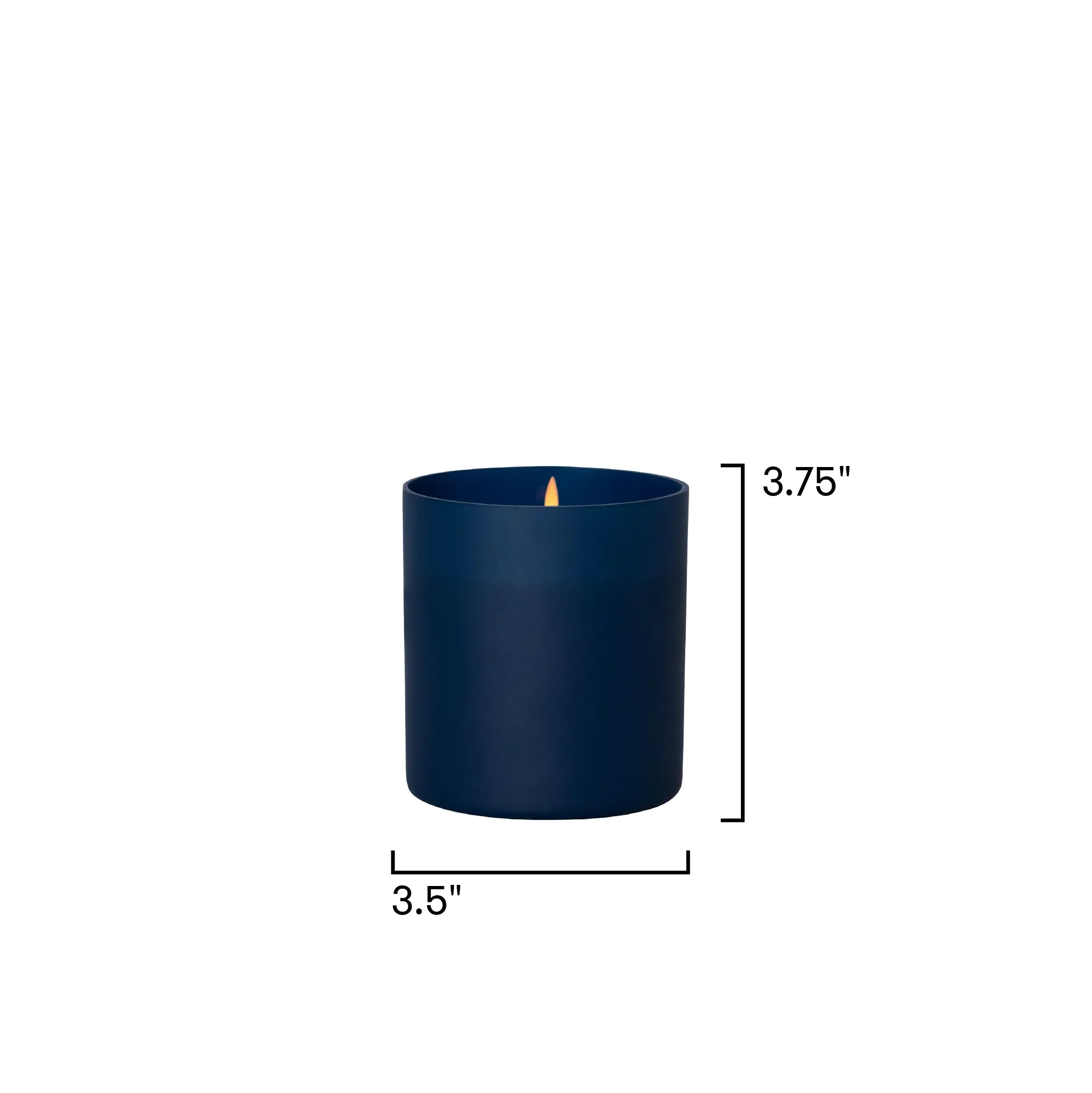 A dark navy blue cylindrical candle with a small flame, shown with dimension lines indicating a height of 3.75 inches and a width of 3.